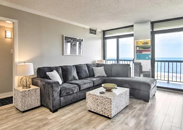 Holiday home Balcony + Perks: Beachfront Ocean Gem *